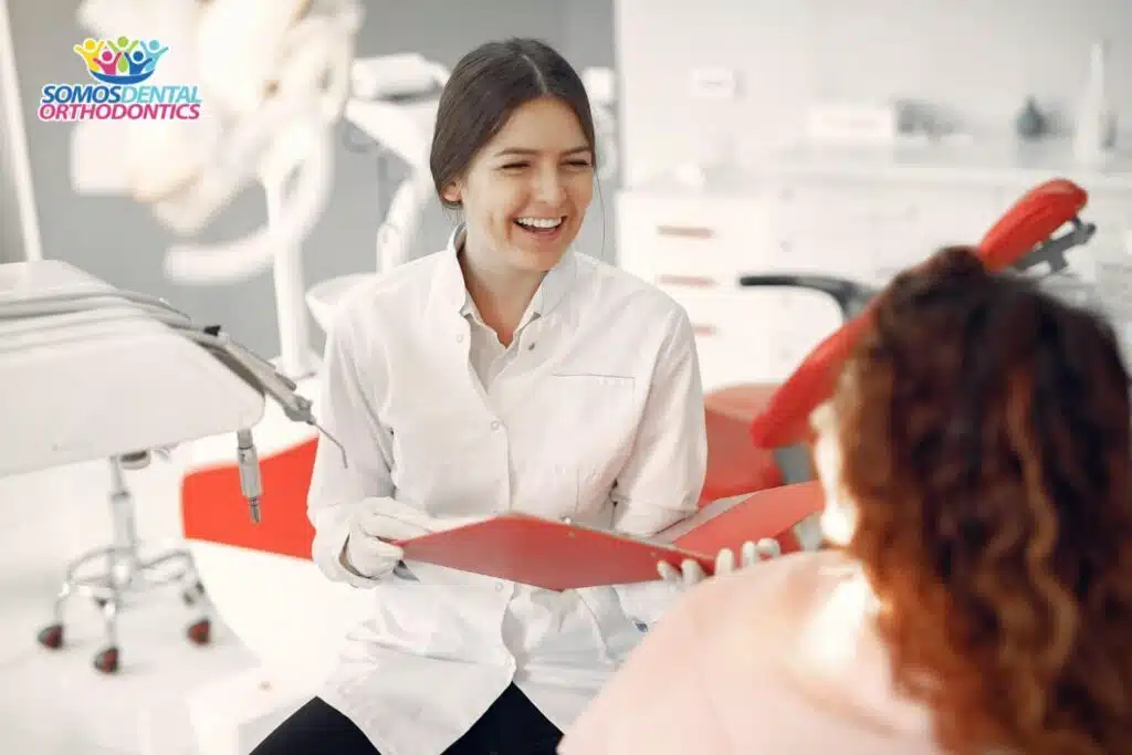 beautiful girl sitting dentist office understanding the braces cost in phoenix arizona