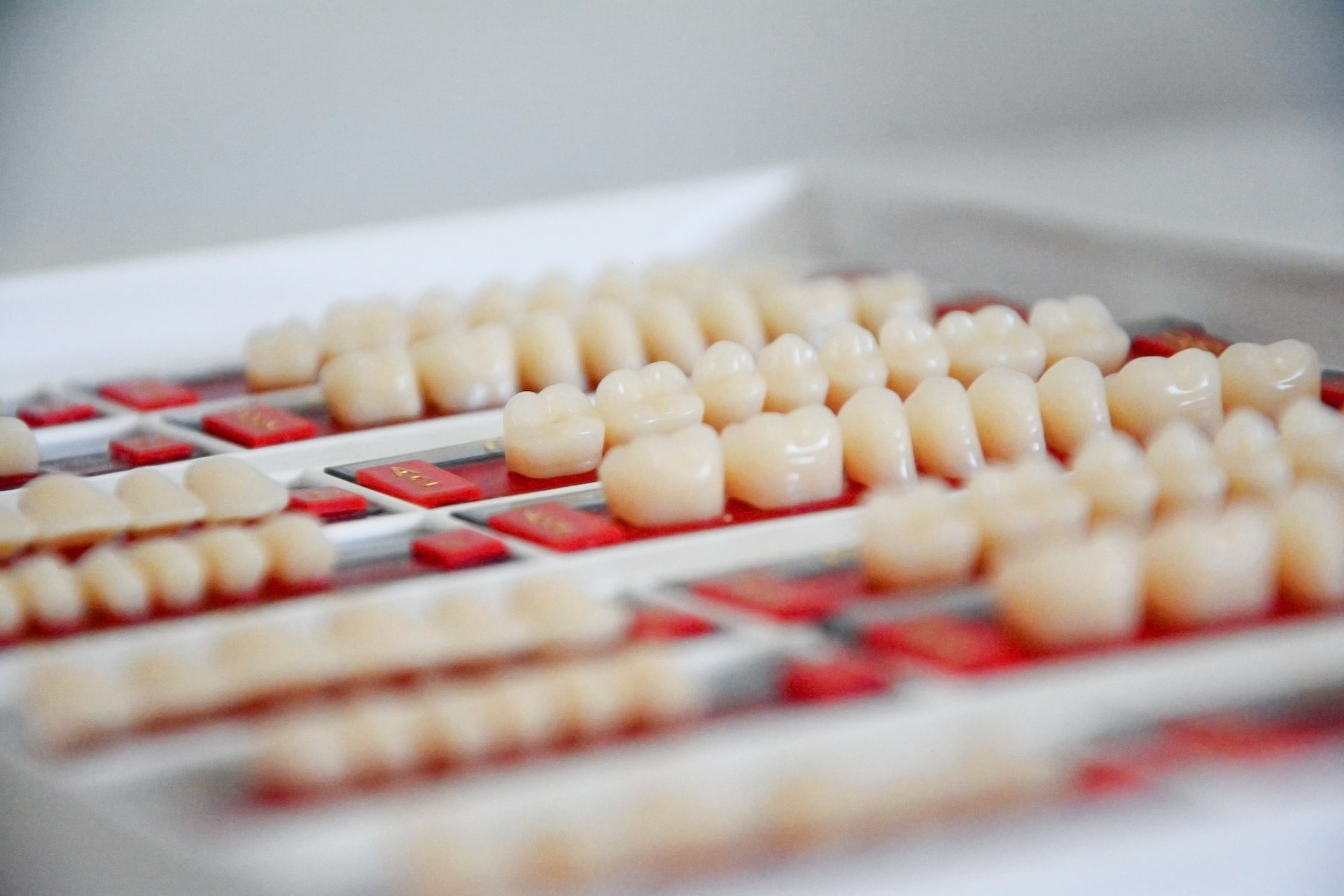 dental implants in different shapes and sizes to show what are dental crowns made of