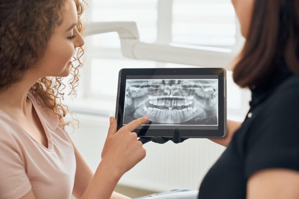 selective focus x ray picture teeth tablet to explain if can you get braces with wisdom teeth