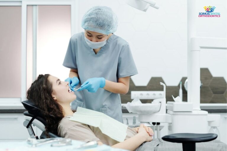 woman-in-the-dentist-clinic-getting-a-check-up-and-learning-how-to-get-cheap-braces-without-insurance