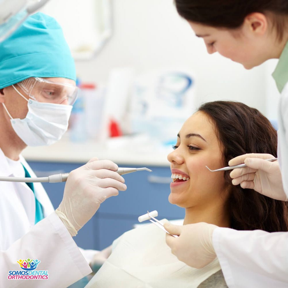 dentist doing a basic teeth cleaning to a patient in phoenix