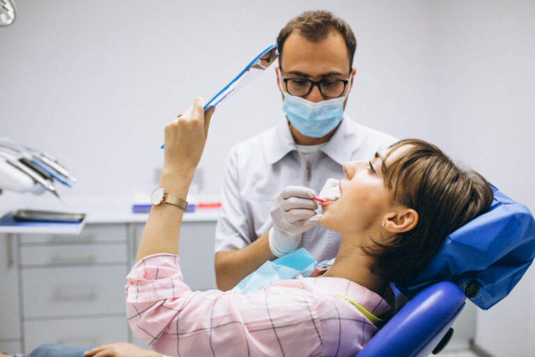 Woman patient at dentist questioning how long will my teeth feel loose after braces