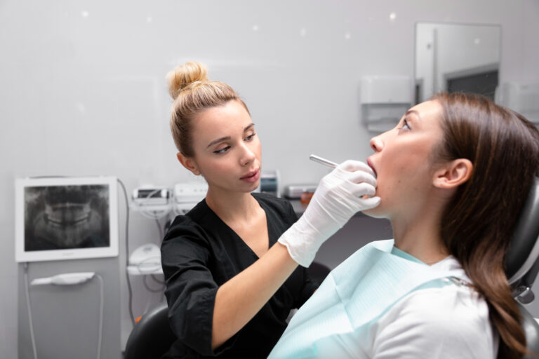 Medium shot dentist helping patient and explaining how long is wisdom teeth surgery