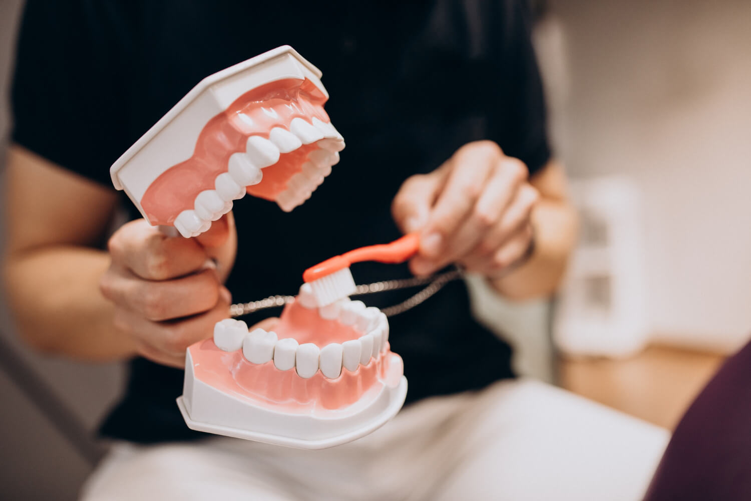 dentist cleaning denture